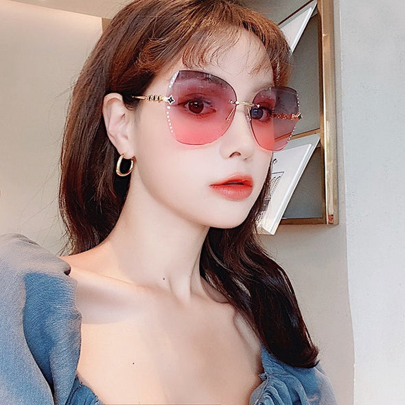 new diamond-studded four-leaf clover rimless sunglasses ladies fashion face-covering street shooting explosions sunglasses