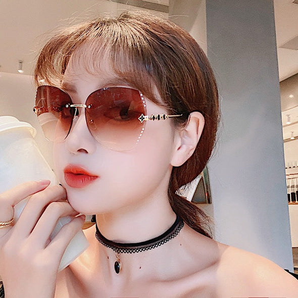 new diamond-studded four-leaf clover rimless sunglasses ladies fashion face-covering street shooting explosions sunglasses