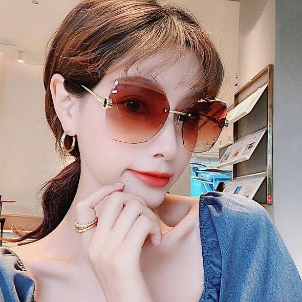 new diamond-studded four-leaf clover rimless sunglasses ladies fashion face-covering street shooting explosions sunglasses