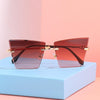 2021 new rimless Sunglasses European and American personality cat's Eye Sunglasses