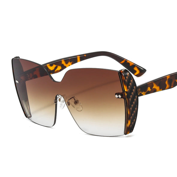 New frameless body color patch women's Sunglasses European and American style gorgeous avant-garde Sunglasses